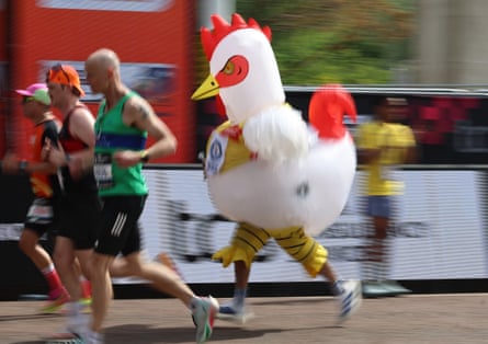 A runner in a chicken costume