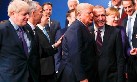 Donald Trump and Recep Tayyip Erdoğan get close at the summit in Watford.