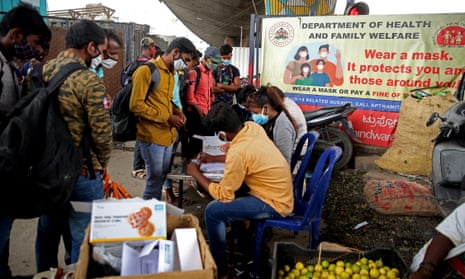 People register to give swab samples for a Covid test in Bangalore, India,