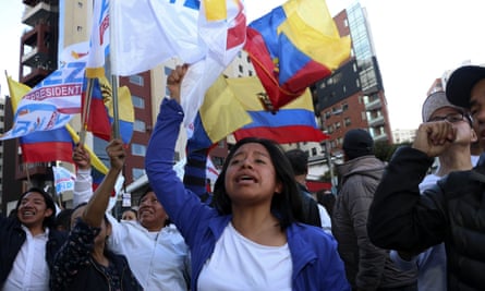 Supporters of Guillermo Lasso protest near the headquarters of the National Electoral Council in Quito.