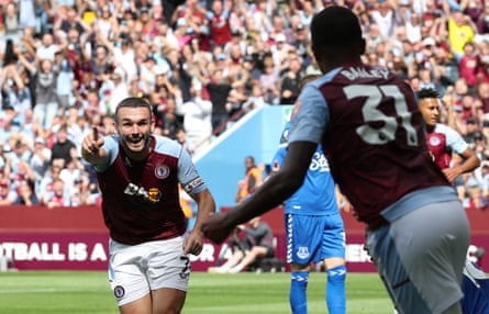 John McGinn races towards Leon Bailey as they celebrate Aston Villa’s opening goal