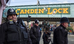 Police on patrol at Camden lock, close to the scene of recent knife crime.