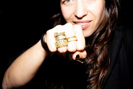 Paulita Pappel make a fist for the camera.