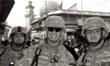 three men in military gear