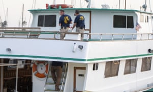 FBI investigators climb aboard the Vision, a sister vessel to the scuba boat Conception to document its layout and learn more about the deadly pre-dawn fire in Santa Barbara, California.