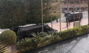 Police vans parked outside the Costa Adeje Palace hotel in Tenerife.