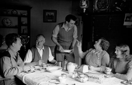 Breakfast at Brookfield Farm … Seated around the table are Phil Archer (Norman Painting), Dan (Harry Oakes), Doris (Gwen Berryman), and Christine (Pamela Mant). Standing is farm labourer Len Thomas (Arnold Peters) photographed for Picture Post in June 1953.