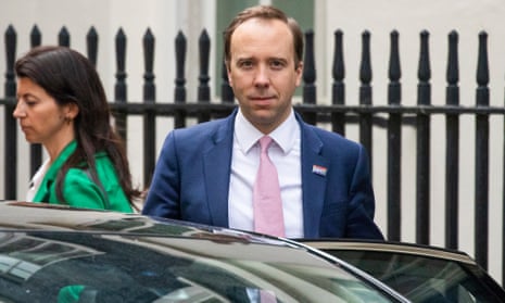 Matt Hancock leaving Downing Street with Gina Coladangelo in May; the health secretary resigned after their affair became public.