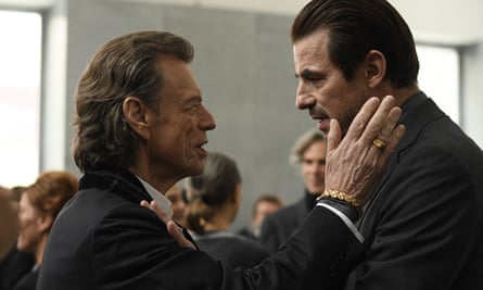 This image released by Sony Pictures Classics shows Mick Jagger, left, and Claes Bang in The Burnt Orange Heresy.
