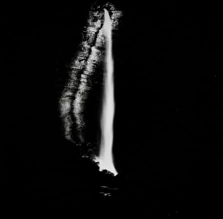 A waterfall at night.