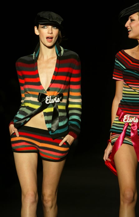 Models in Rykiel’s signature coloured striped outfits on the spring/summer 2004 catwalk.