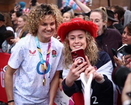 England’s full-back Ellie Kildunne smiles for a selfie as England players enjoy the Red Roses Champions Party.