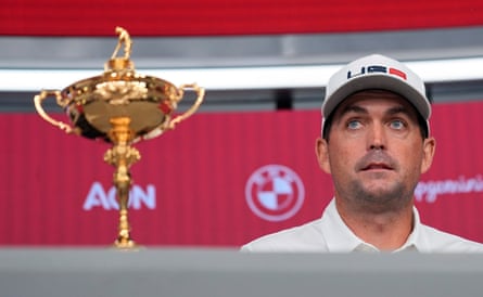 Keegan Bradley at a press conference alongside the Ryder Cup trophy.