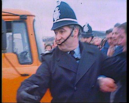 A police officer at a riot.