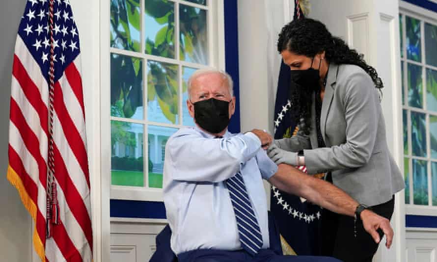 Joe Biden gets his booster at the White House in September last year.