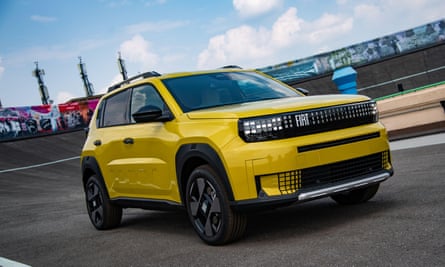 A yellow Fiat Grande Panda on a track
