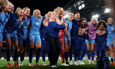 Sarina Wiegman with her England team after beating Australia in the semi-final