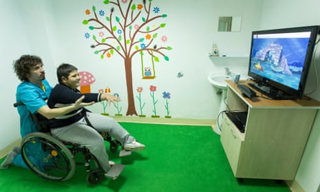 A patient undergoes physical therapy with a game developed by Mira Rehab.