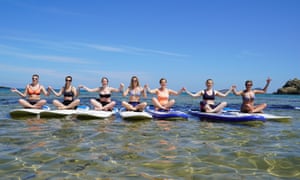 SUP yoga classes take place in the sea