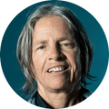 Eileen Myles, a person smiling in portrait