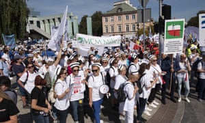 Healthcare professionals have been marching in Warsaw, Poland, to demand better pay and conditions.