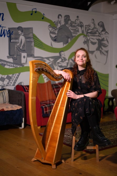 Catherine Crean with a harp