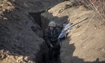 A Ukrainian serviceman is seen in the trenches in the frontline of Bakhmut.