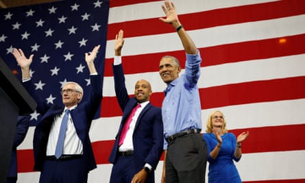 Barack Obama waves to the crowd during a rally for Wisconsin Democratic candidates in Milwaukee in October 2018.