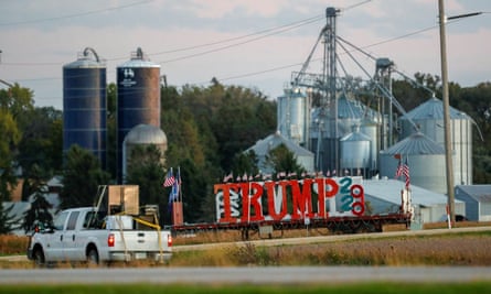 A truck passes a sign in support of Donald Trump near Rochester, Minnesota.