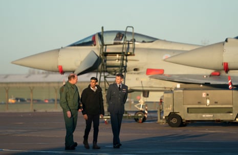 Air Chief Marshal Mike Wigston (left) and Station Commander for RAF Coningsby Billy Cooper (right) with Rishi Sunak during his visit to RAF Coningsby in Linconshire today.