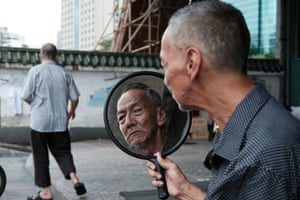 Uncle Chen was living under a bridge in Guangzhou, China. This photo is from the moment he was able to see his new look. Shortly after meeting Uncle Chen, I was contacted by friends from China that he was recently killed in a car accident.