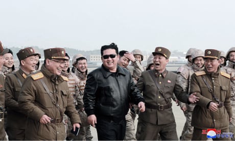 TOPSHOT-NKOREA-MILITARY-MISSILE<br>TOPSHOT - This picture taken on March 24, 2022 and released from North Korea's official Korean Central News Agency (KCNA) on March 25, 2022 shows North Korean leader Kim Jong Un (C) walking with North Korean military personnel during the test launch operation of what state media reports a new type inter-continental ballistic missile (ICBM), the Hwasongpho-17 of North Korea's strategic forces in an undisclosed location in North Korea. (Photo by various sources / AFP) / South Korea OUT / ---EDITORS NOTE--- RESTRICTED TO EDITORIAL USE - MANDATORY CREDIT "AFP PHOTO/KCNA VIA KNS" - NO MARKETING NO ADVERTISING CAMPAIGNS - DISTRIBUTED AS A SERVICE TO CLIENTS / THIS PICTURE WAS MADE AVAILABLE BY A THIRD PARTY. AFP CAN NOT INDEPENDENTLY VERIFY THE AUTHENTICITY, LOCATION, DATE AND CONTENT OF THIS IMAGE --- / (Photo by STR/AFP via Getty Images)