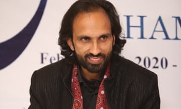 Ahmad Farhad posing for a photograph at an event