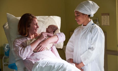 Nurse Lucille Anderson (Leonie Elliott) with her latest delivery at Nonnatus House in Call the Midwife, series eight.