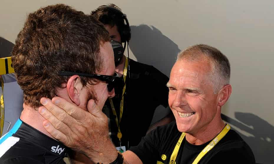 Shane Sutton, right, congratulates Bradley Wiggins after his 2012 Tour de France victory; Wiggins has credited the Australian with helping him achieve that victory.