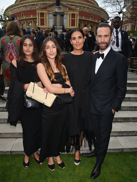 Actor Joseph Fiennes with his wife, María Dolores Diéguez, and daughters outside the Royal Albert Hall in London in 2024