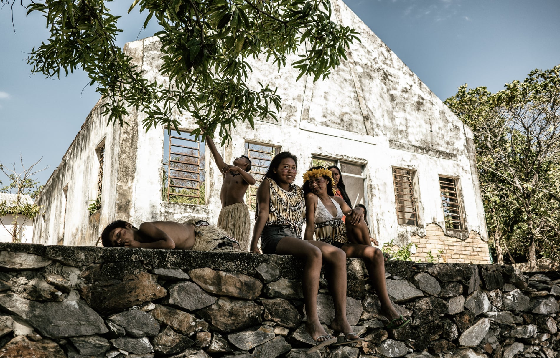 Young Macuxi people wait to perform at the assembly of the indigenous council, which represents the majority of those living in the Raposa reserve. 