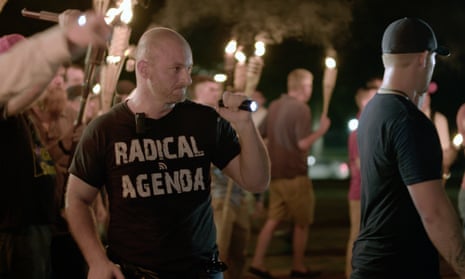 In this 11 August 2017 image made from a video provided by Vice News Tonight, Christopher Cantwell attends a white nationalist rally in Charlottesville, Virginia.