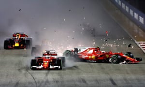 Sebastian Vettel (No5) collides with Ferrari team-mate Kimi Raikkonen on the opening lap.