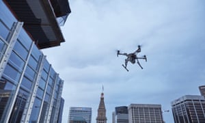 This February 2017 photo provided by DJI Technology Inc. shows a test of a type of drone in downtown Denver, that the New York Police Department can use to reduce risk to officers and bystanders during a response to dangerous situations. The department said Tuesday, Dec. 4, 2018, that potential uses for its 14 drones include search and rescue, hard-to-reach crime scenes, hostage situations, and hazardous material incidents.