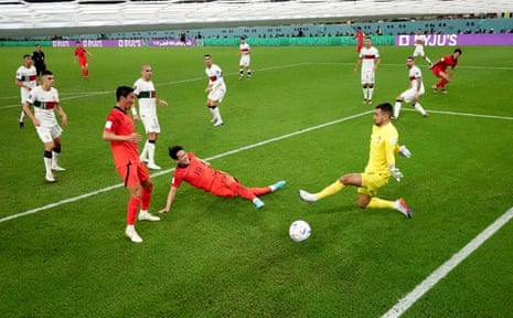 South Korea’s Kim Young-gwon scores their first goal.