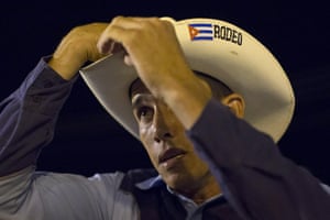 Cowboy Andre Rodriguez, 23, gets ready to perform in the rodeo