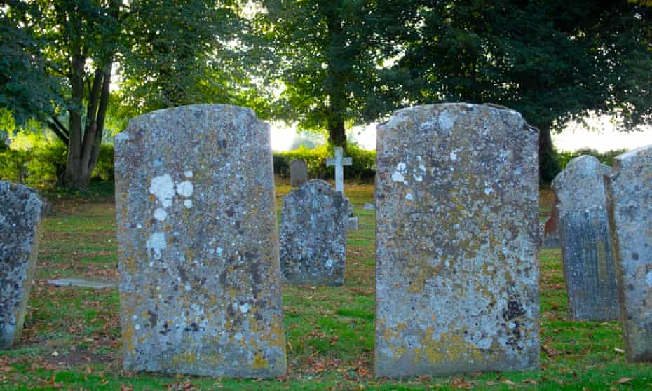 Lichen on gravestones in a churchyard in Egleton, Rutland