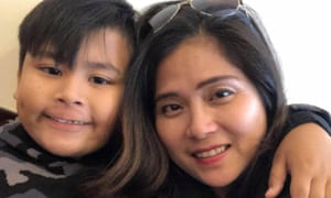 Bernadette Romulo, pictured with her 8-year-old son, faced deportation to the Philippines before the new visa was granted.