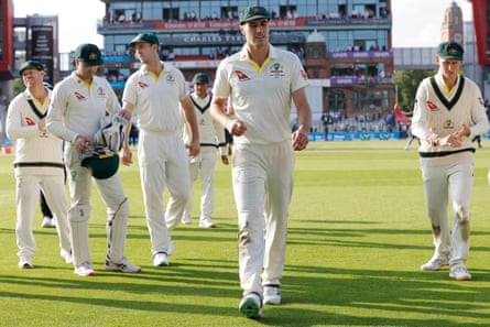 Australia captain Pat Cummins leaves the field at stumps during day two of the 4th Ashes Test match between England and Australia at Emirates Old Trafford.