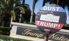 A protest outside the Trump Doral golf club in Miami. For many voters in Florida the impeachment trial still left a black cloud over his presidency.