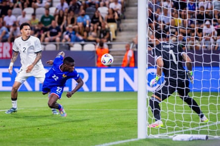 Thierno Barry heads the ball