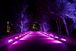 Enlighten Festival Canberra-26 February - 8 March. The National Gallery bridge. In this years projection Artist Joan Ross asks us to think about museums as places that keep, acquire, and classify objects. Sunday 28th February 2021. Photograph by Mike Bowers. Guardian Australia