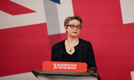 Yvette Cooper, standing at a lecture in front of a large Confederate flag backdrop last month.
