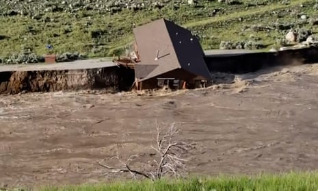 A house collapses into a raging river in Gardiner, Montana.